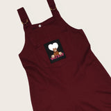 Macacão em tom vinho com detalhe lúdico infantil feminino Antonita para meninas 