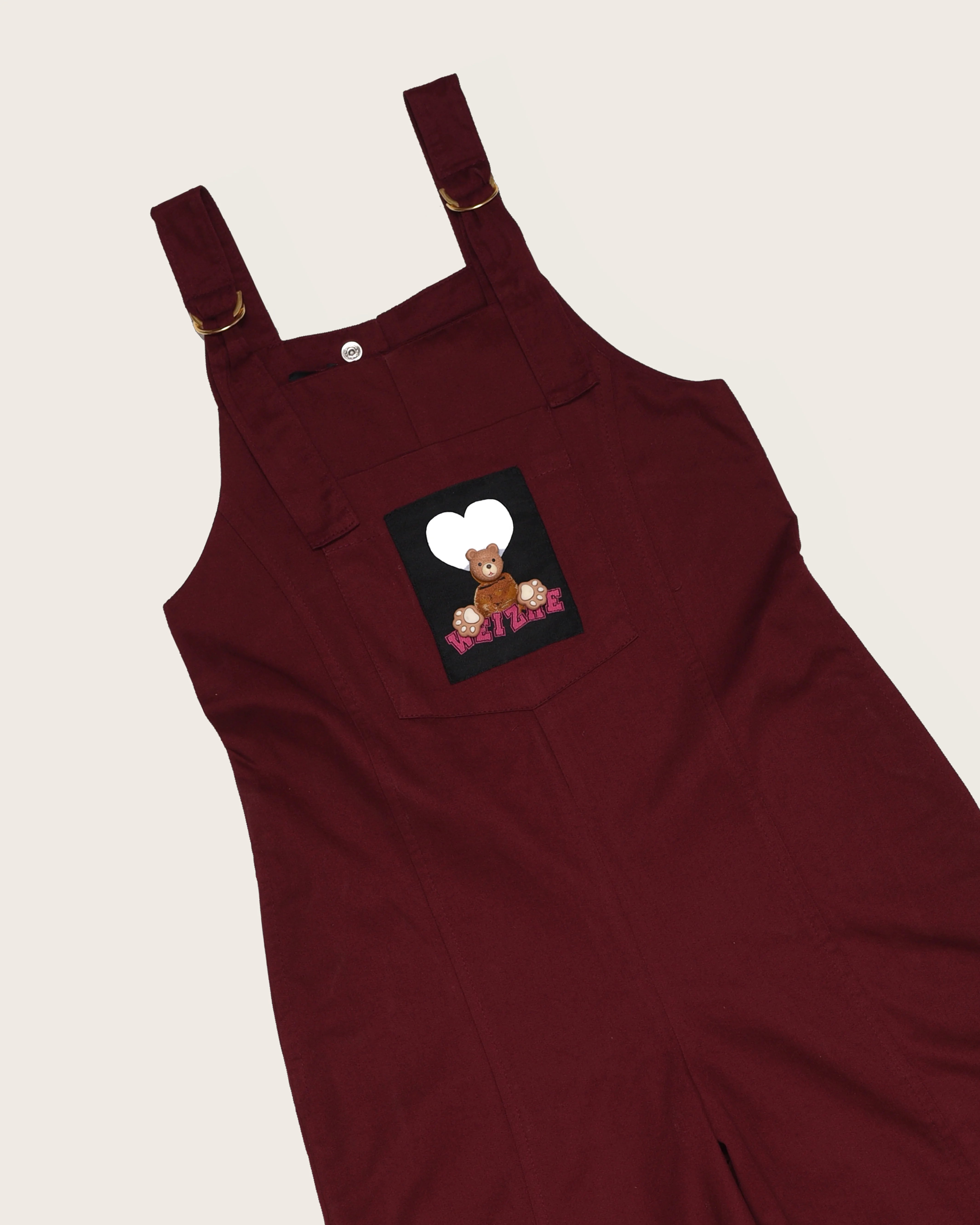 Macacão em tom vinho com detalhe lúdico infantil feminino Antonita para meninas 