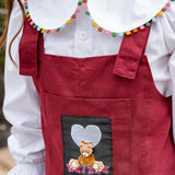 Macacão em tom vinho com detalhe lúdico infantil feminino Antonita para meninas 