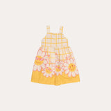 Macacao feminino infantil amarelo com estampa de flores coloridas e alças largas