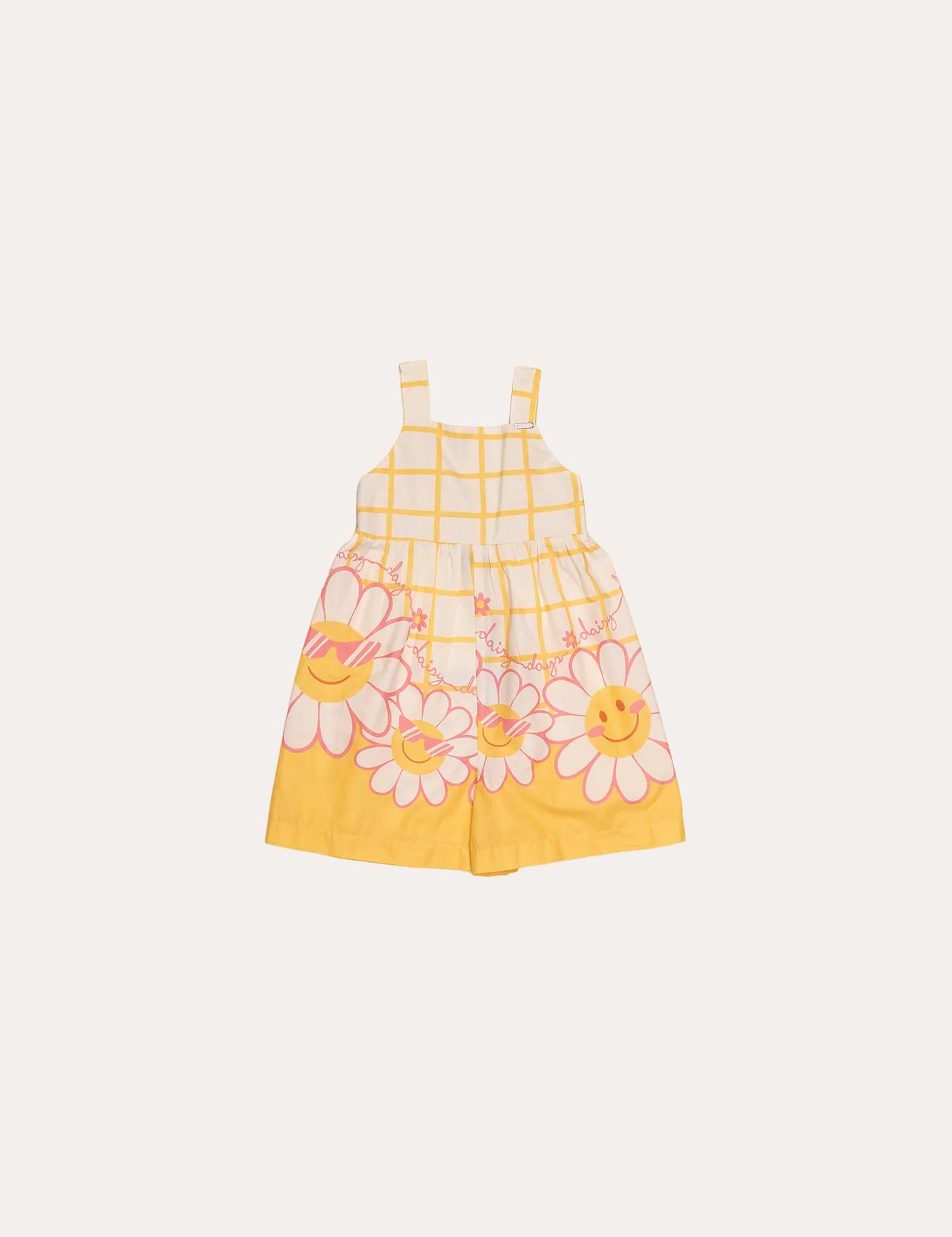 Macacao feminino infantil amarelo com estampa de flores coloridas e alças largas