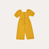 Macaco tricoline amarelo com mangas bufantes e botões frontais, peça feminina infantil