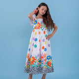 Vestido midi feminino infantil com estampa de flores e bolinhas coloridas, mangas bufantes e saia solta