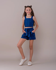 Conjunto infantil feminino azul escuro com blusa de alças largas e saia com cintura elástica