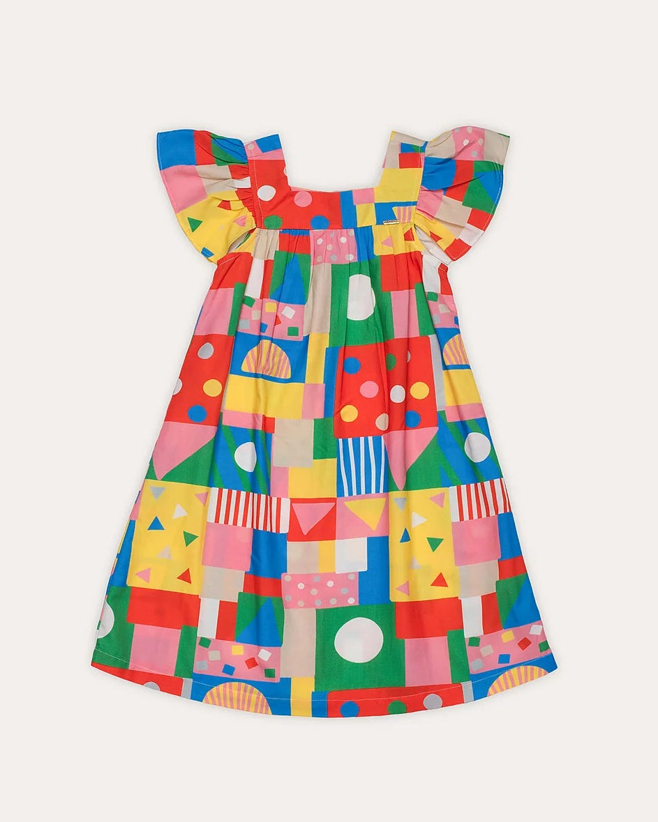Vestido infantil com estampa de blocos coloridos e alças em babados