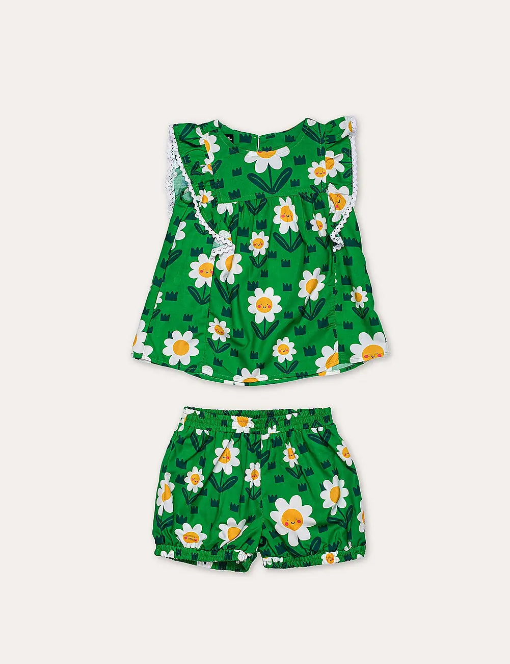 Conjunto infantil feminino com blusa verde e short, estampa de flores brancas e detalhe em renda