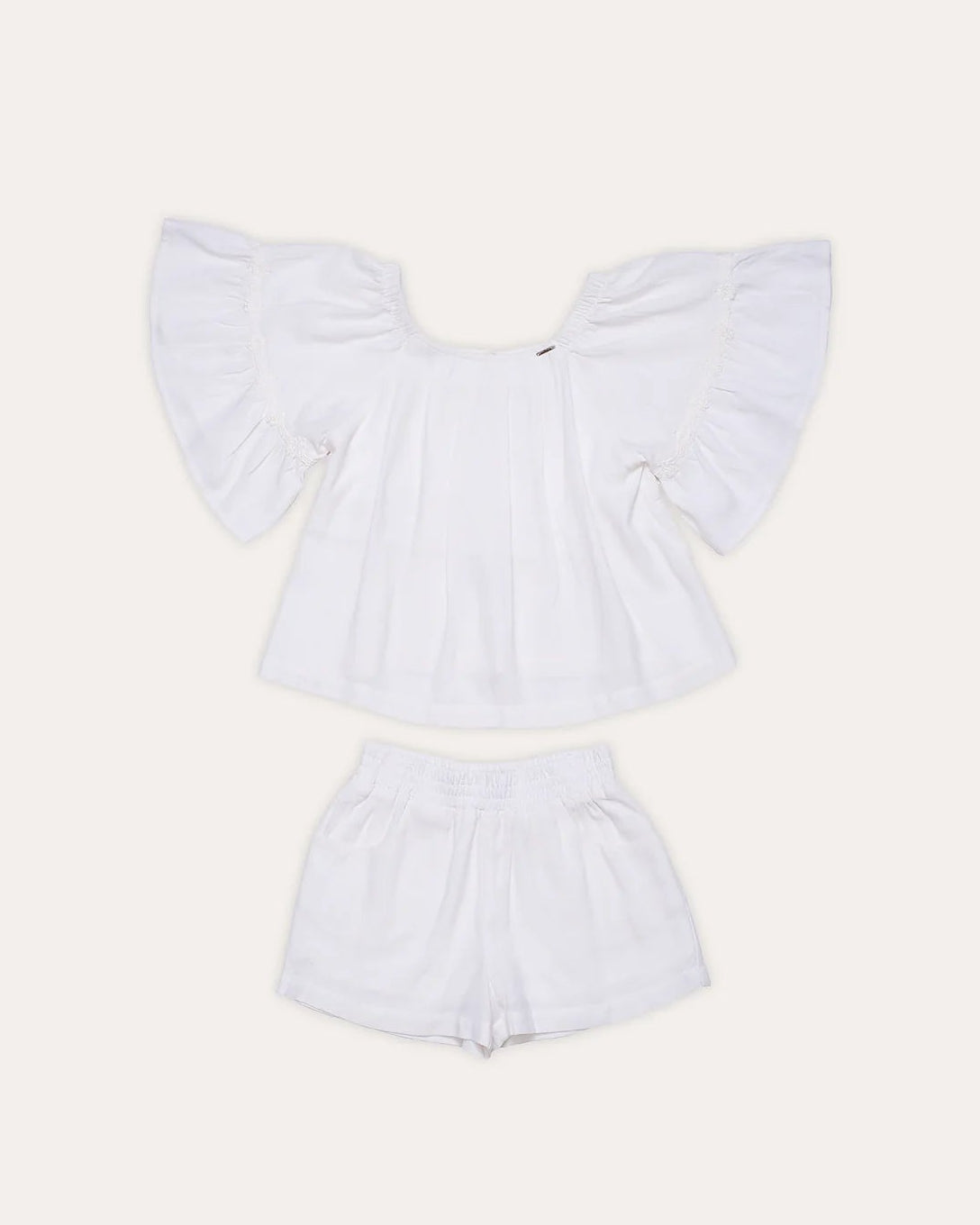 Conjunto infantil feminino com blusa de mangas amplas e short branco