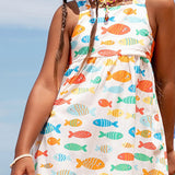 Vestido infantil com estampa de peixes coloridos e saia ampla