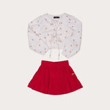 Conjunto feminino infantil com blusa de cerejas e saia vermelha