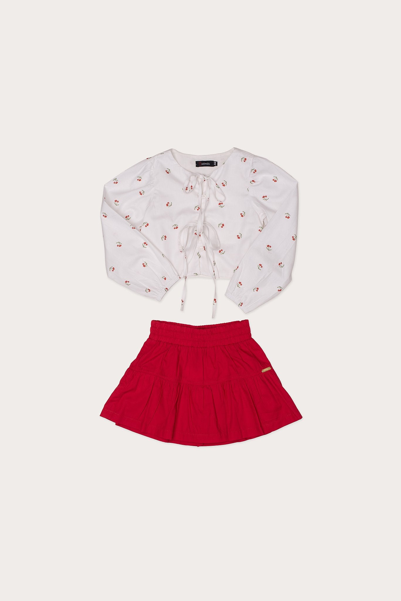 Conjunto feminino infantil com blusa de cerejas e saia vermelha