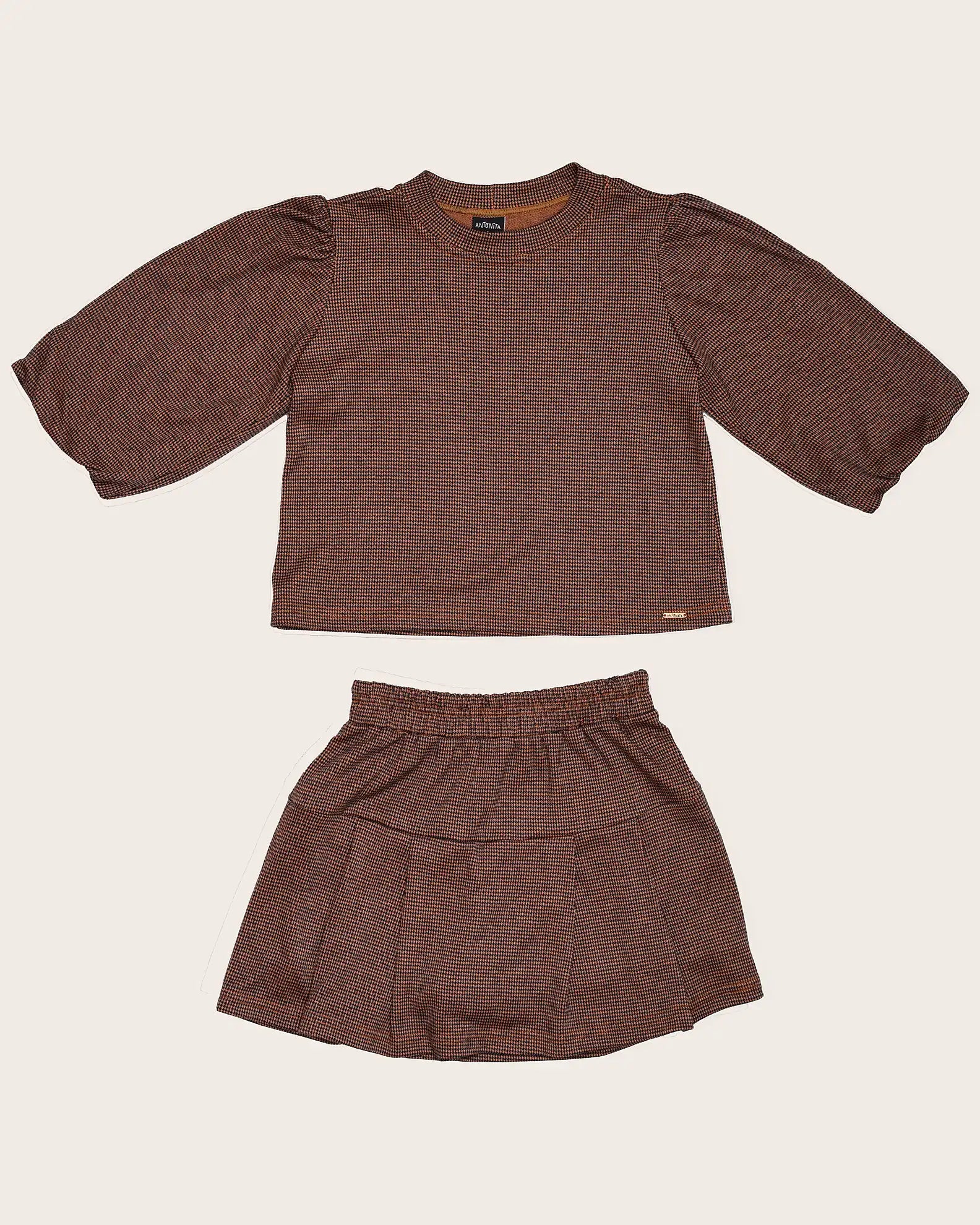 Conjunto curto com blusa de mangas bufantes e saia rodada infantil feminino Antonita para meninas 